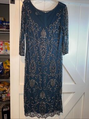 Pisarro Nights Teal Beaded Long-Sleeve Evening Dress. Heavy dress